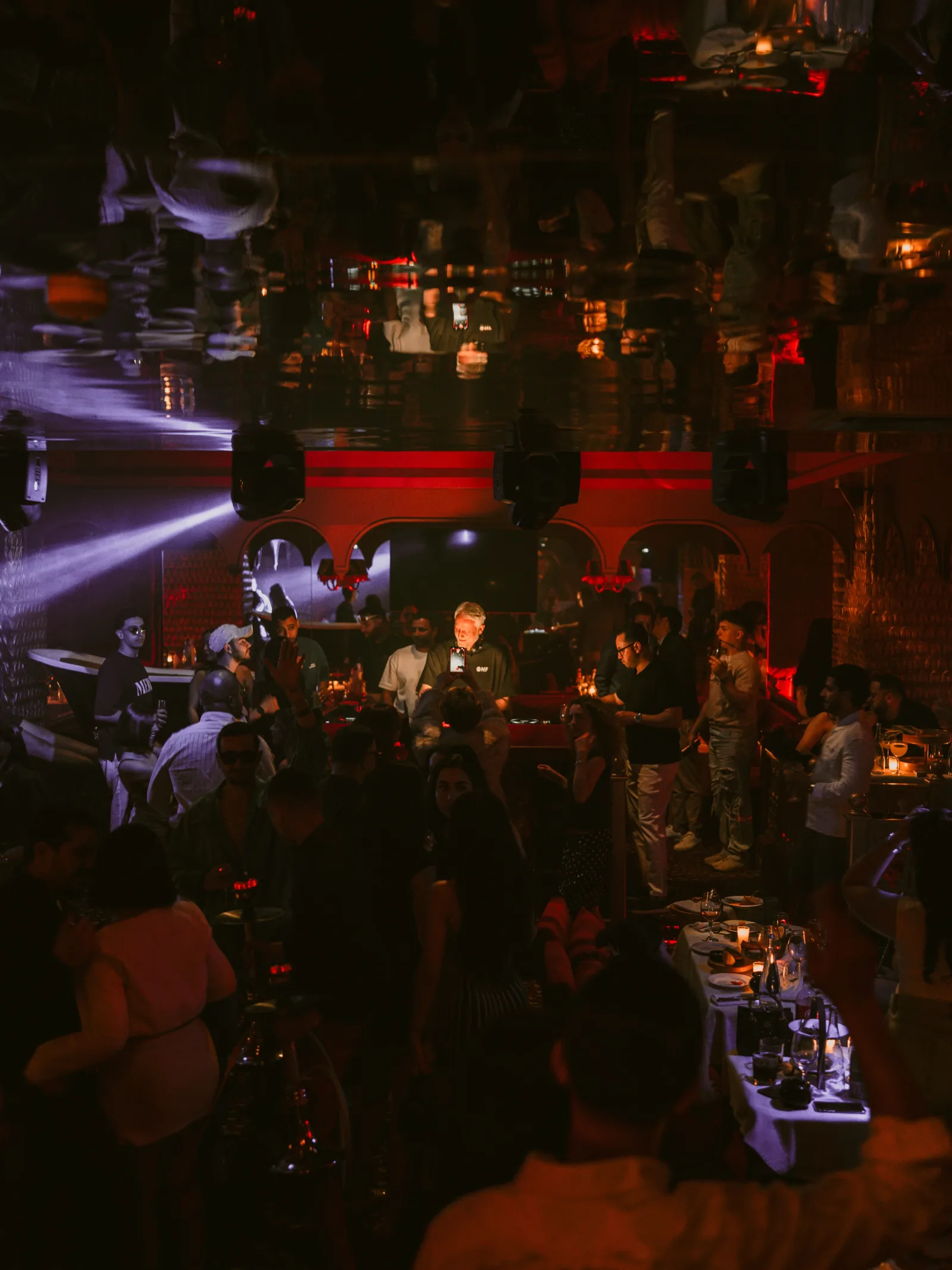 Guests dancing together inside The Club